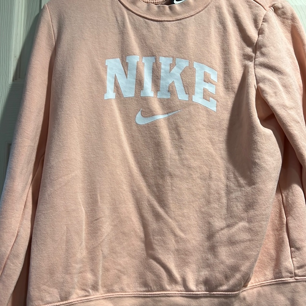 peach nike sweatshirt